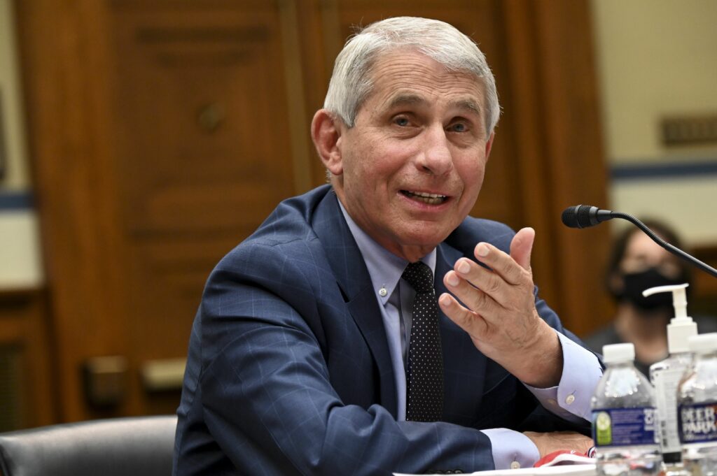 Dr. Anthony Fauci speaking into a microphone
