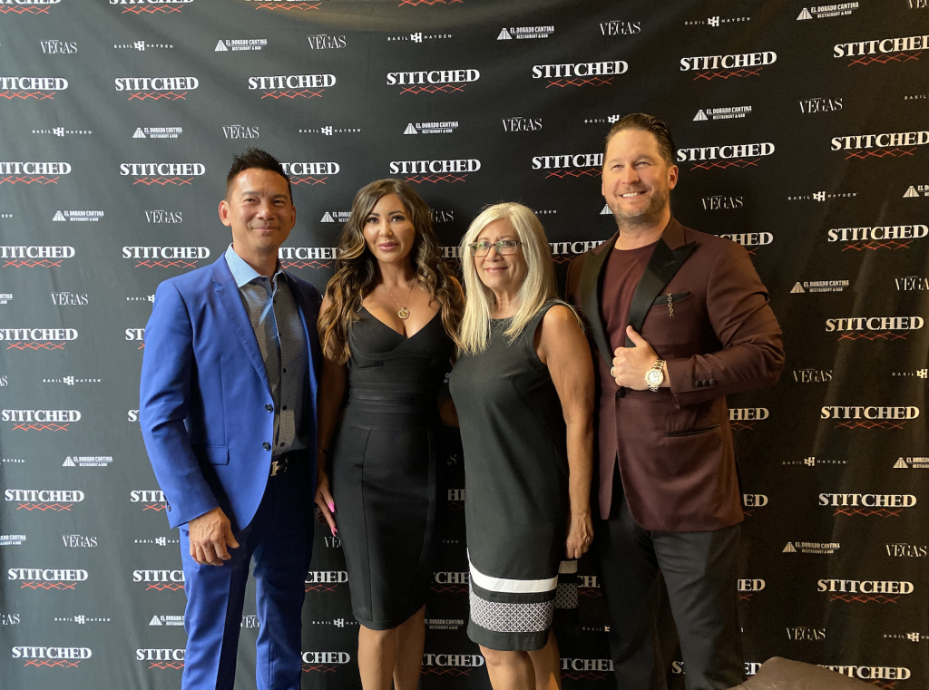 Michele Sullivan and others posing at STITCHED event