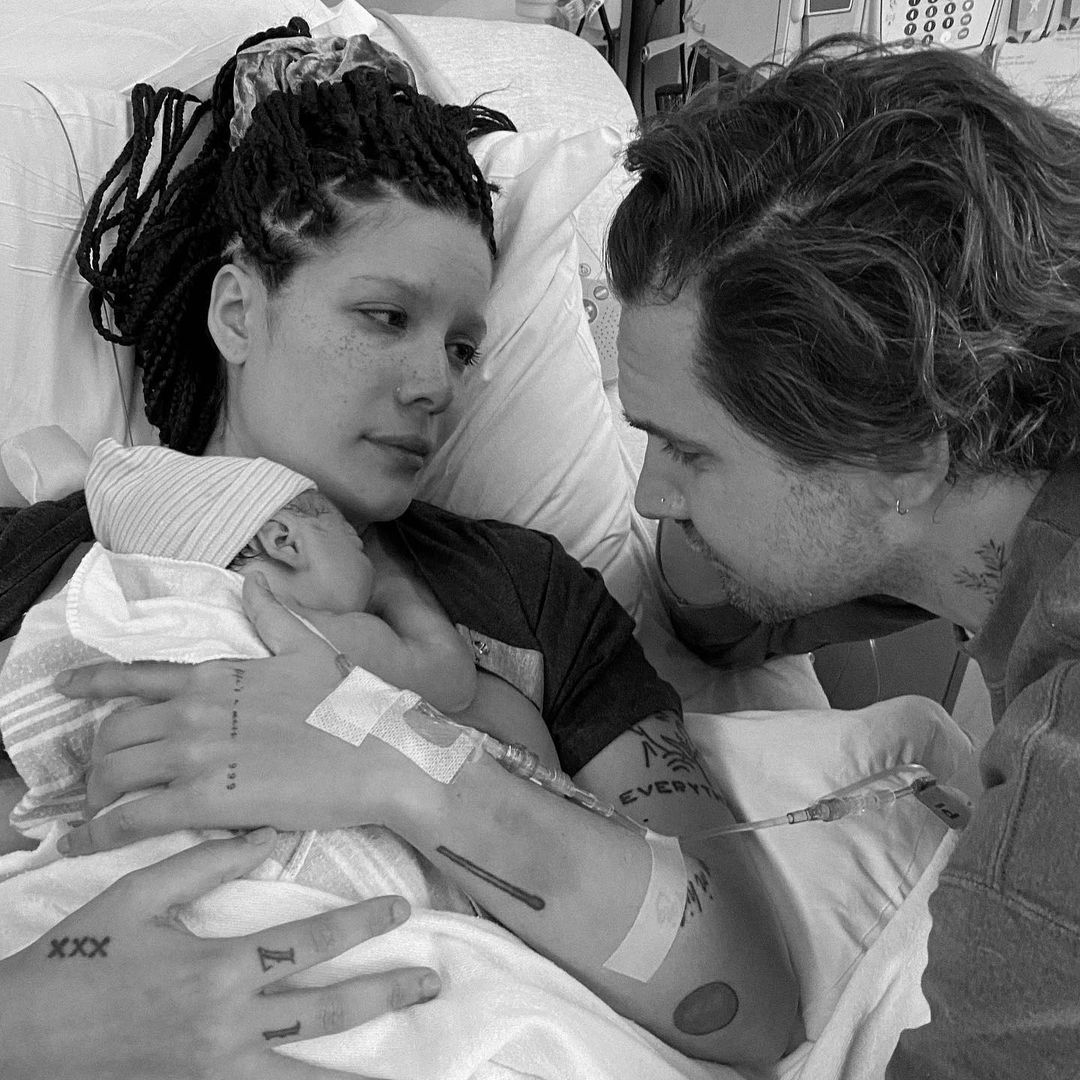 Halsey holding her newborn baby