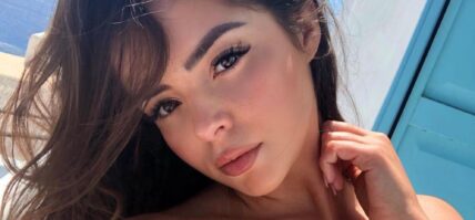 Demi Rose takes a selfie.