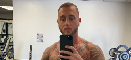 Chet Hanks flexing at the gym