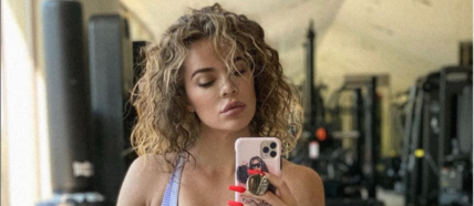 Khloe Kardashian taking a mirror selfie