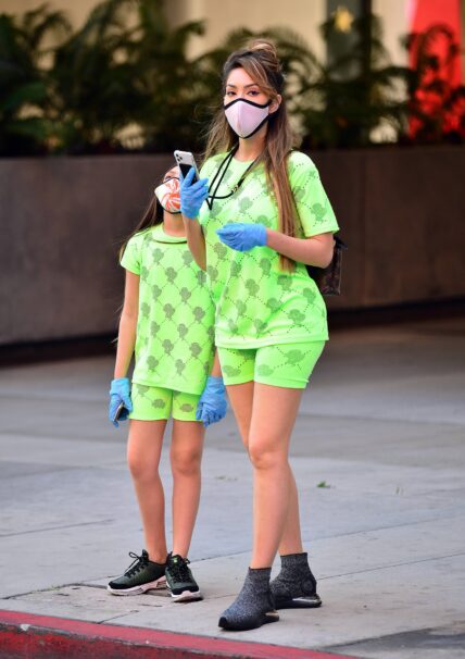 Farrah Abraham and Sophia wear gloves and designer face mask during a walk in Los Angeles
