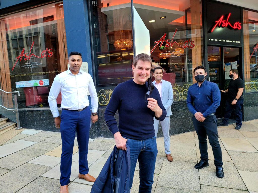 Tom Cruise poses outside curry house where he ordered TWO chicken tikka masalas