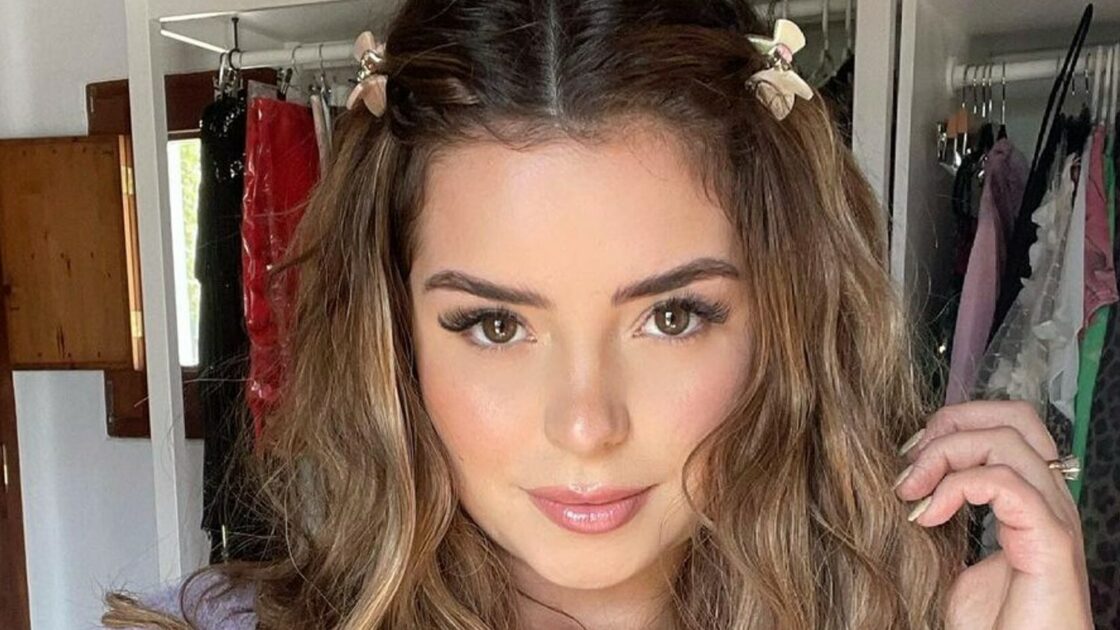 Demi Rose taking a selfie.