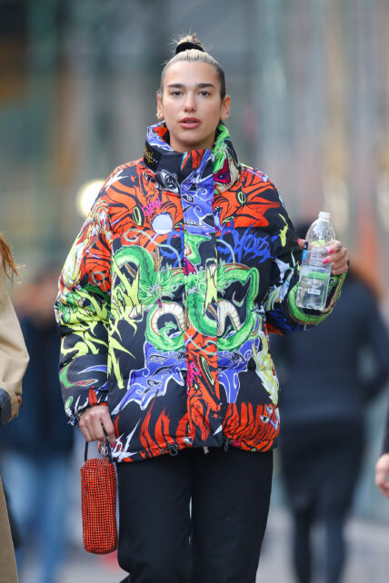 Dua Lipa sips into her water while walking around in NYC on Jan 10 2020
