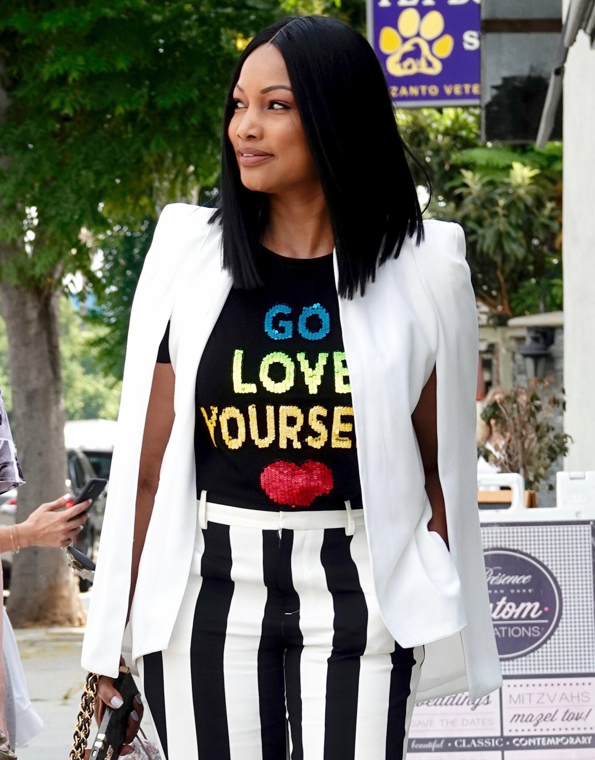 Haitian actress Garcelle Beauvais is seen doing a bit of retail shopping with a blonde female confidante.