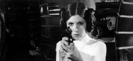 Carrie Fisher appears in a black and white photo as Princess Leia in Star Wars