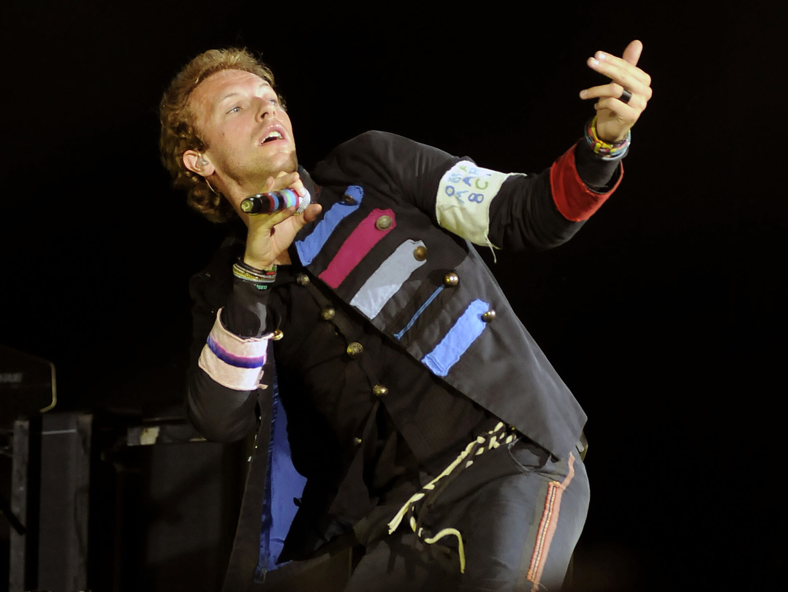 Chris Martin Calls Longtime Girlfriend Dakota Johnson His 'Universe' In London Concert