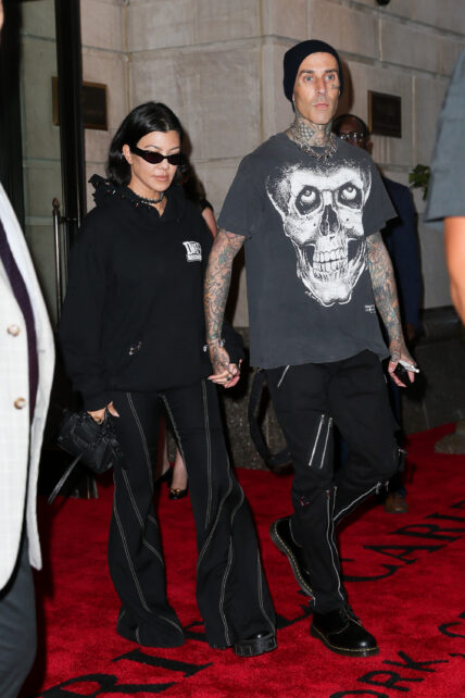 Kourtney Kardashian and Travis Barker seen hand-in-hand as leaving their hotel in NYC
