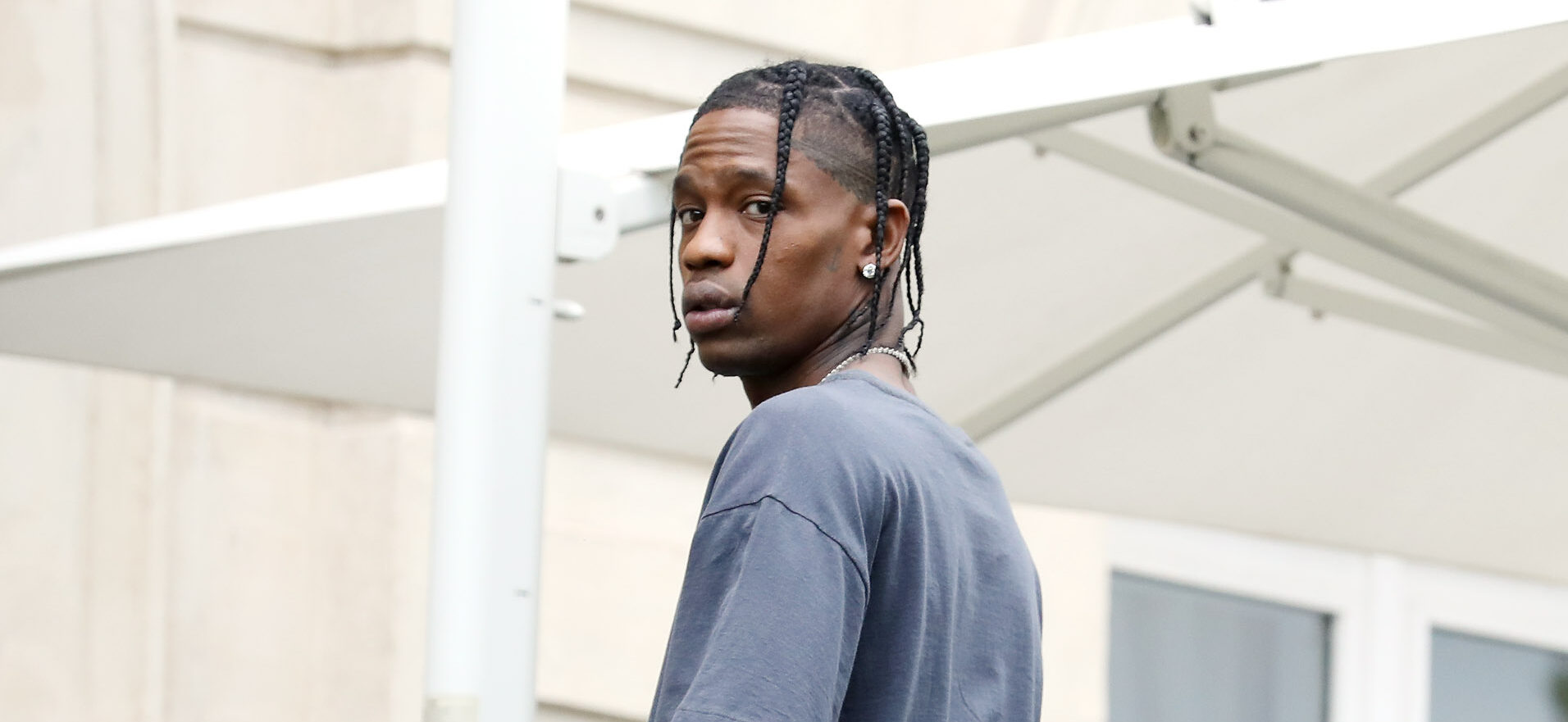Travis Scott shooting for Christian Dior while Paris Fashion week