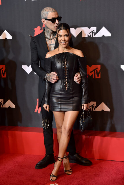Kourtney Kardashian & Travis Barker posing