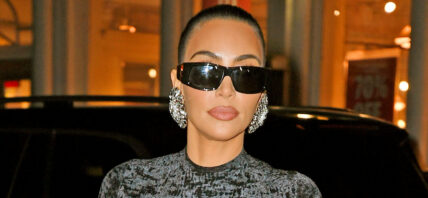 Kim Kardashian standing.