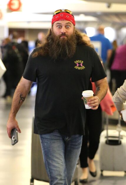 Willie Robertson walking through airport