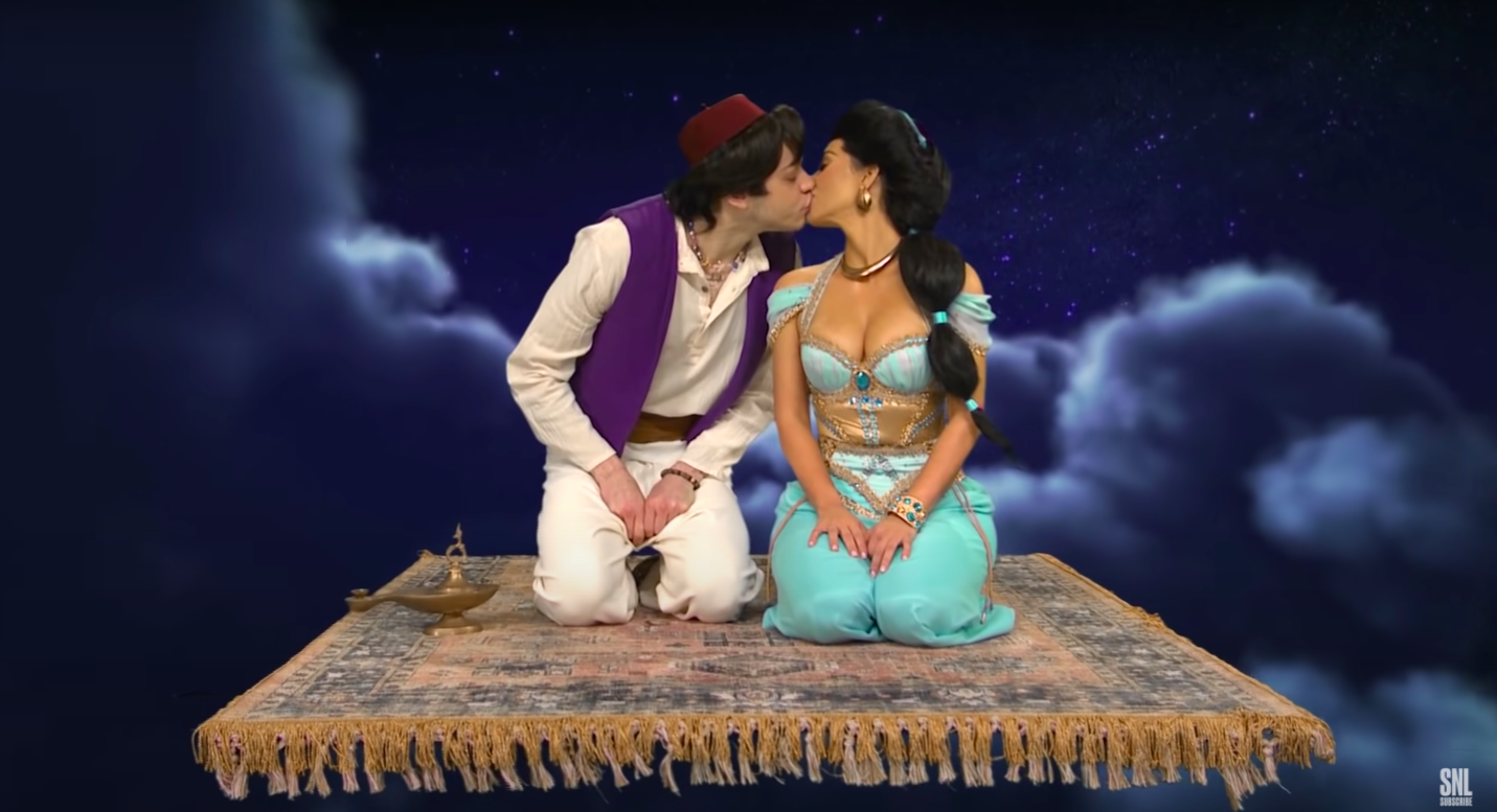 Pete Davidson and Kim Kardashian kissing.