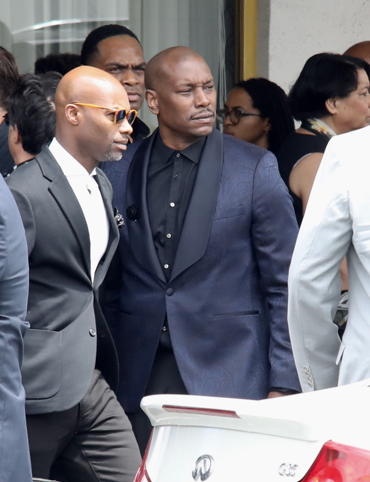 John Singleton family and friends pay tribute at private memorial