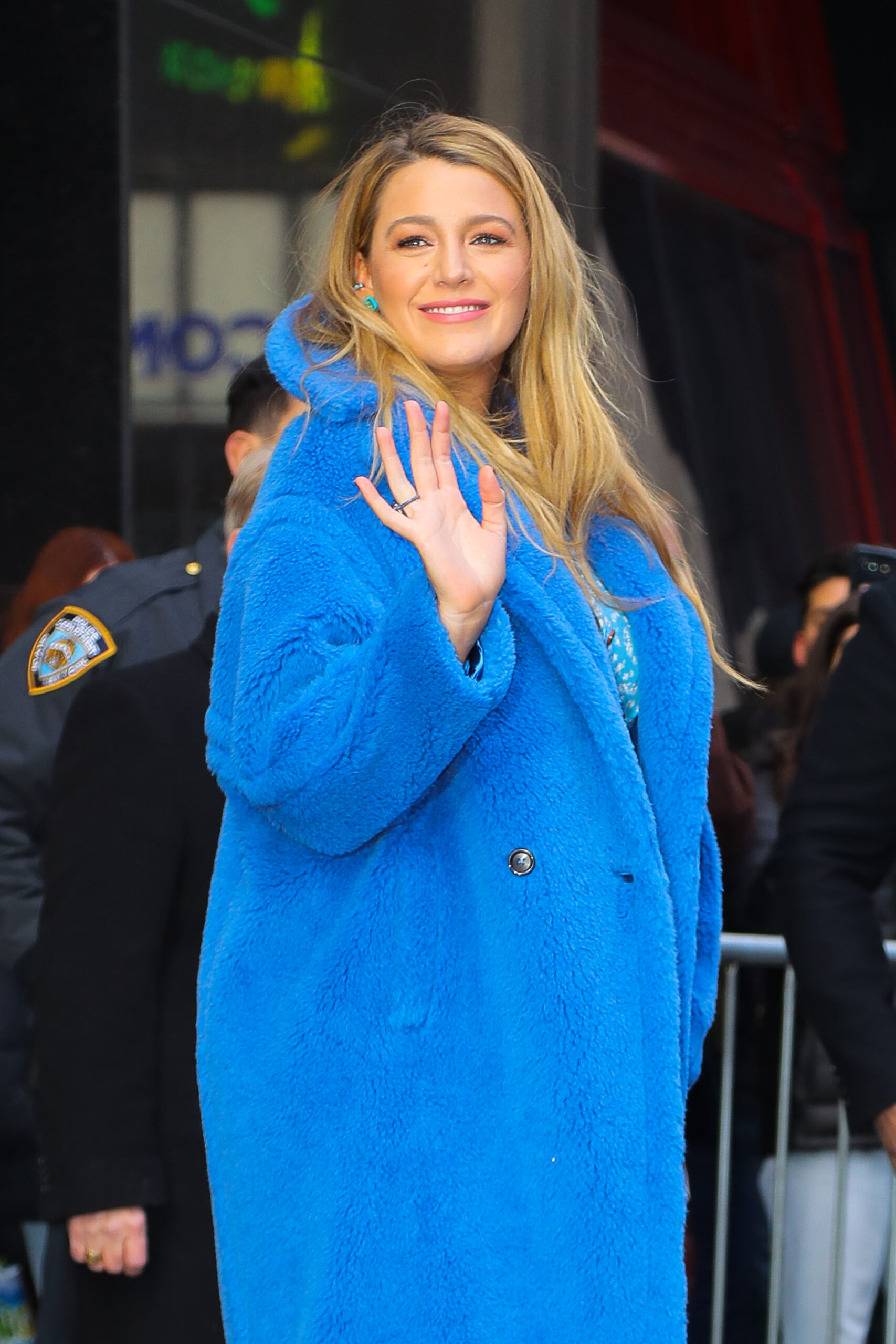 Blake Lively wears a blue fur coat while leaving Good Morning America in NYC
