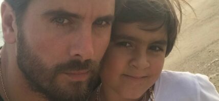 Scott Disick and Mason Disick taking a selfie.