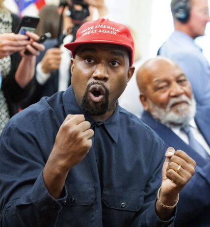 Kanye West in a MAGA hat