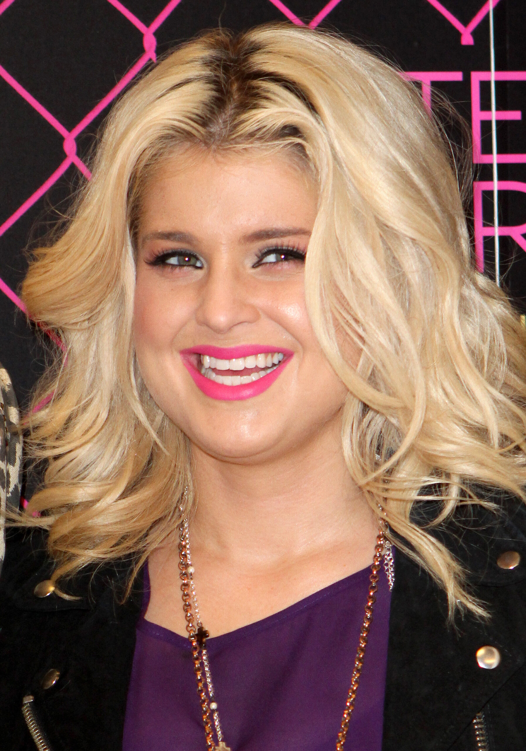 Kelly Osbourne smiling