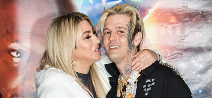 Melanie Martin and Aaron Carter smiling.