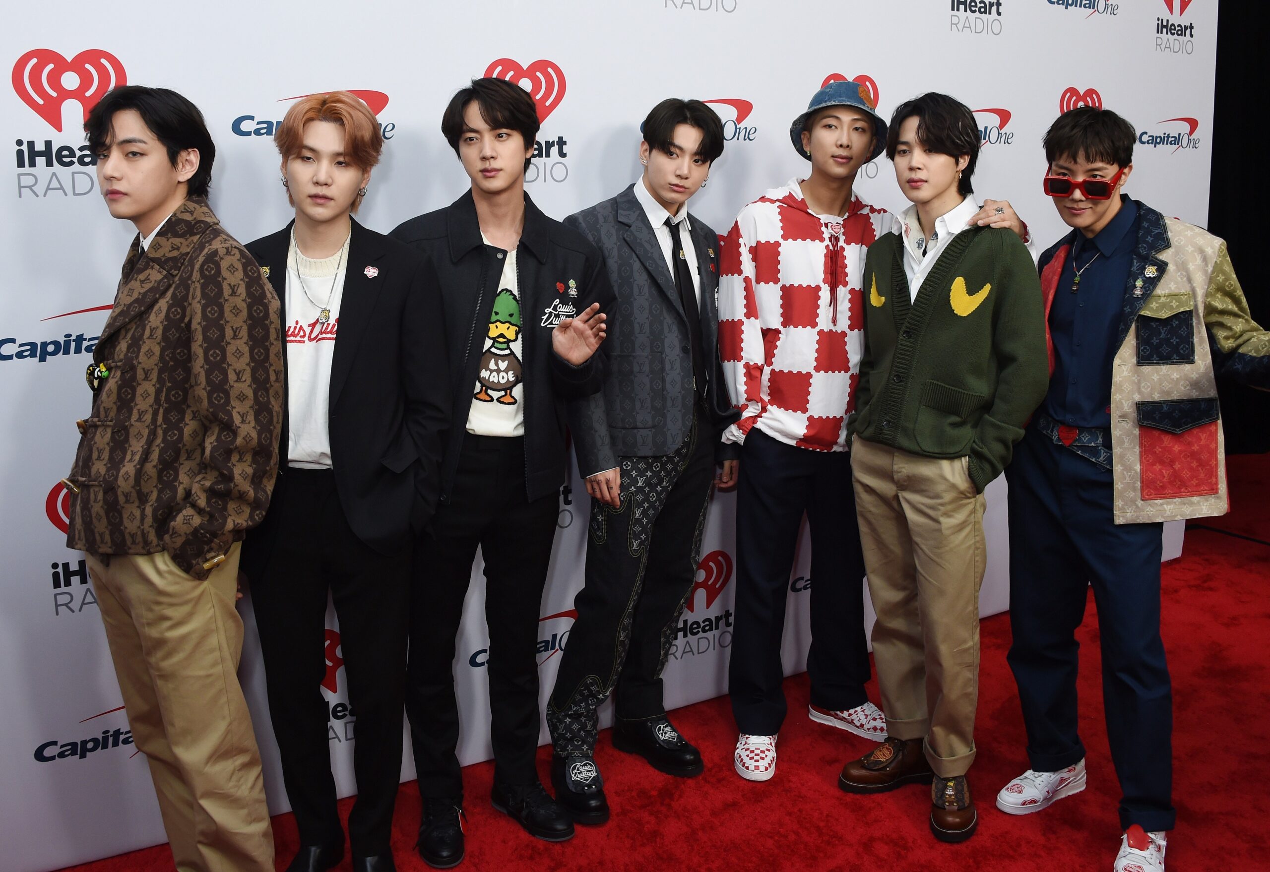 BTS members posing for the camera.