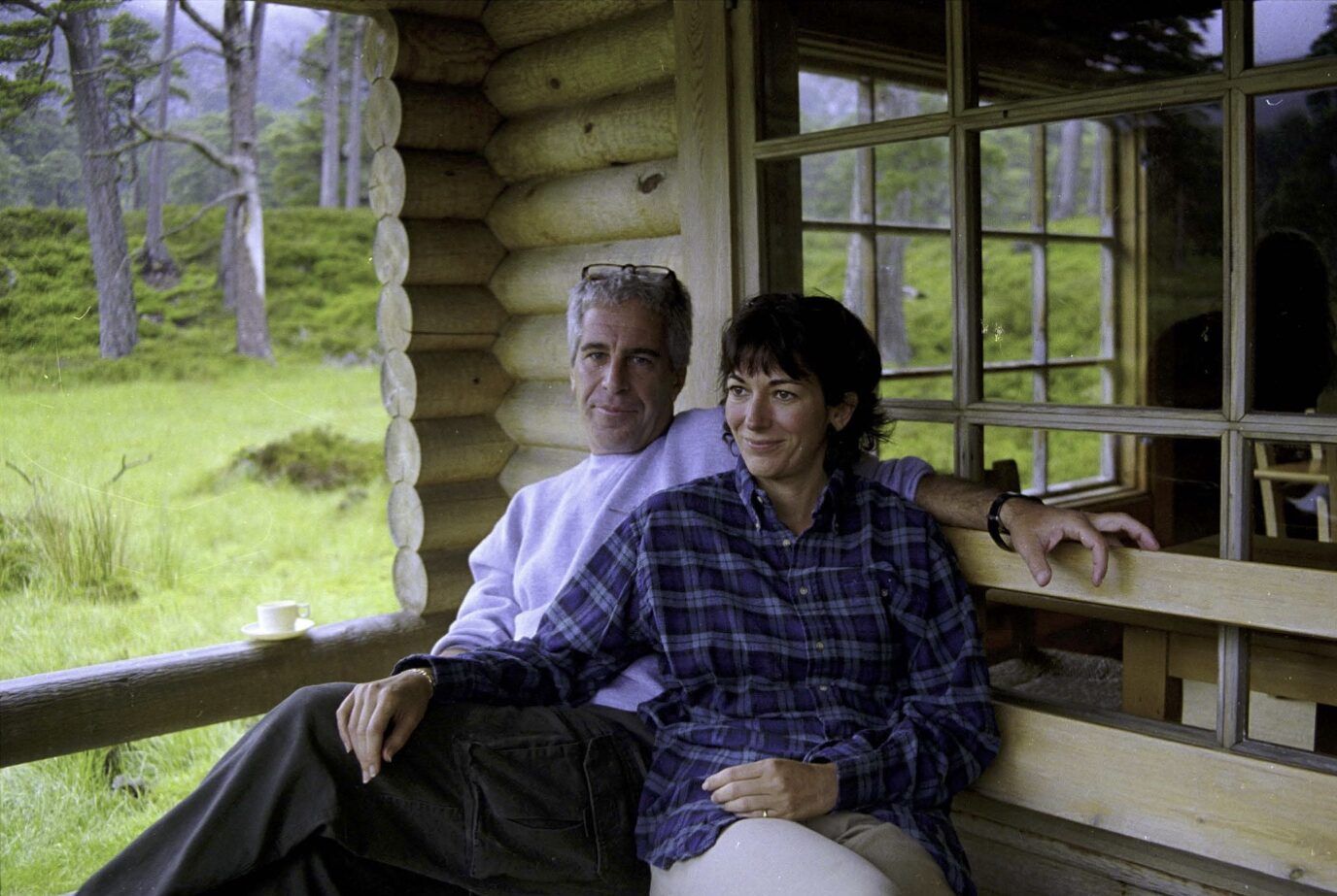 Pictured: Ghislaine Maxwell and Jeffrey Epstein relax at Queens Balmoral log cabin in newly-released photo