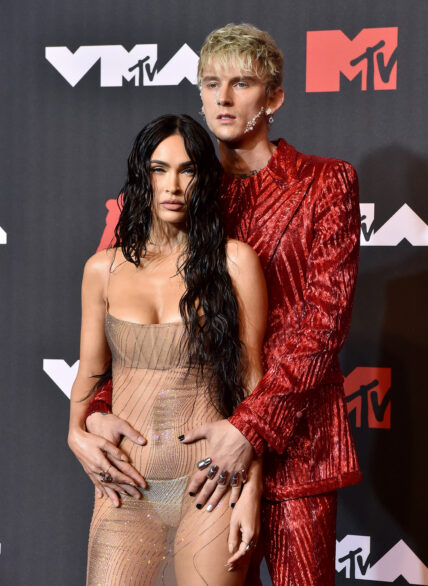 Megan Fox & Machine Gun Kelly Arrive To Party CHAINED Together By Their Fingernails!