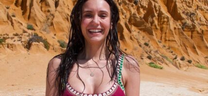 Nina Dobrev rocks a red bikini