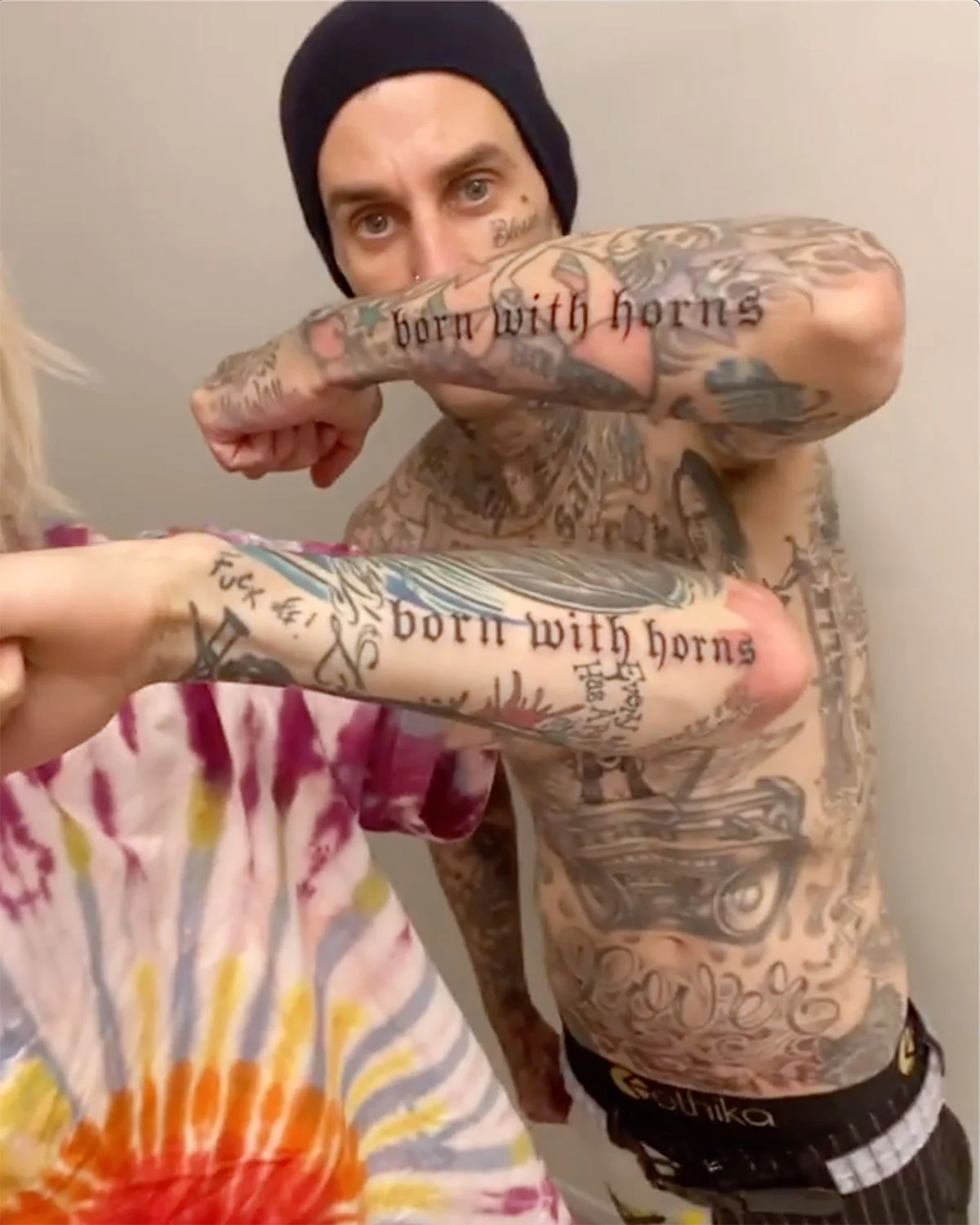 Machine Gun Kelly Changes Album Name, AFTER Travis Barker Tattoos It On His Arm!