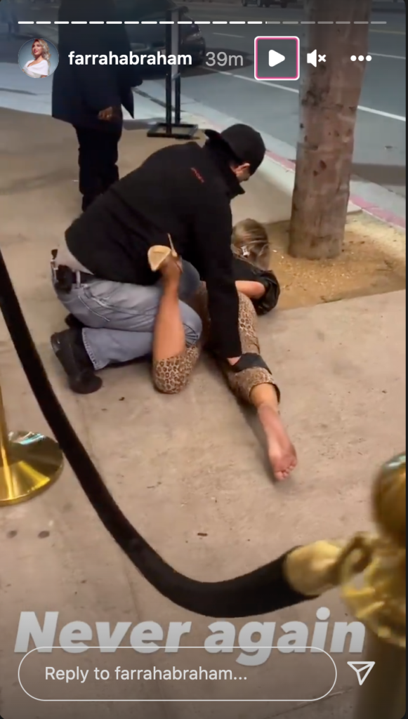 Farrah Abraham being restrained