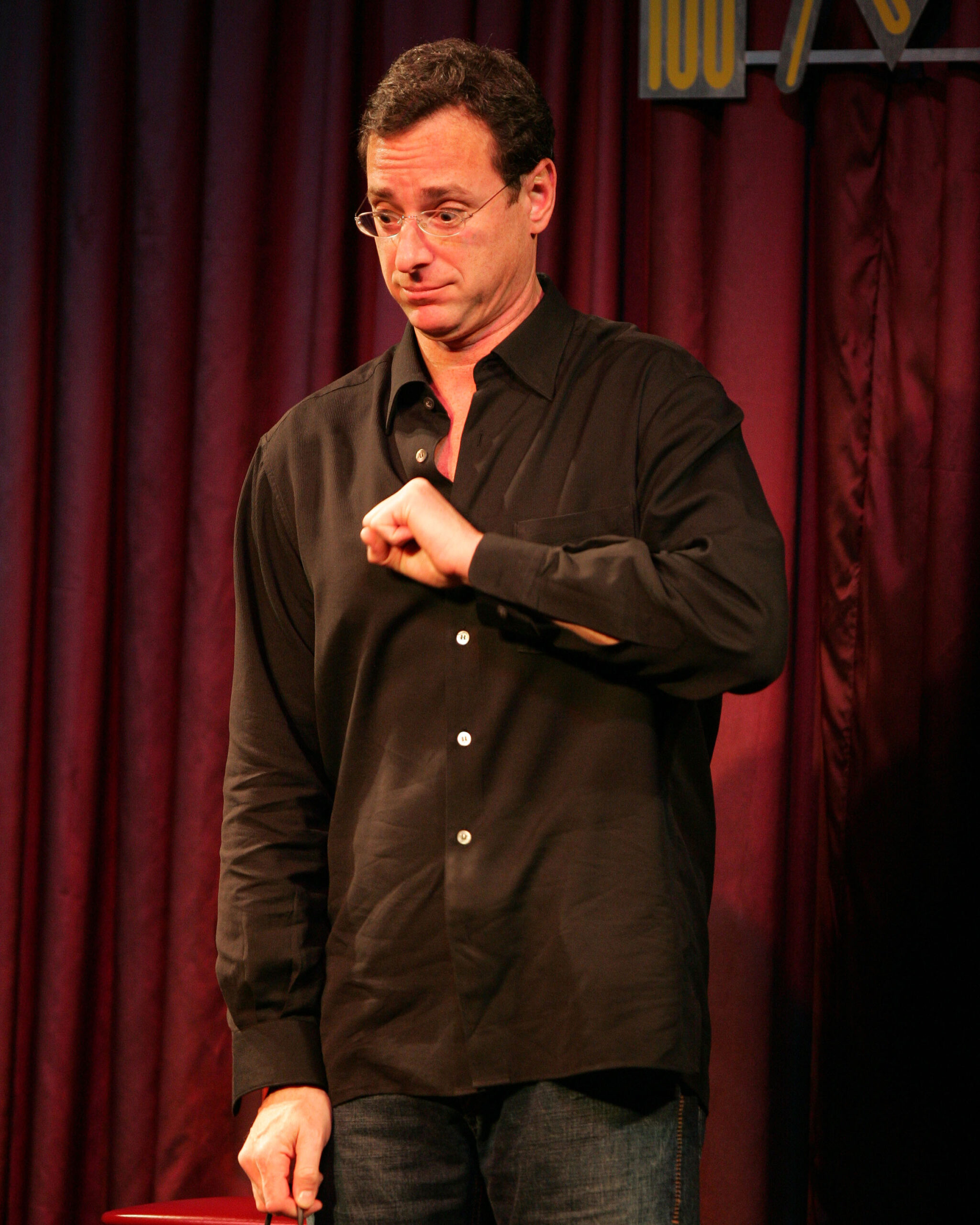 Bob Saget performs at the Improv Comedy Club
