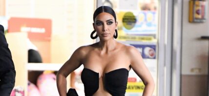 Kim Kardashian is seen at a convenience store after coming from Paris Hiltons wedding looking stunning in a Rick Owens dress with Balenciaga accessories