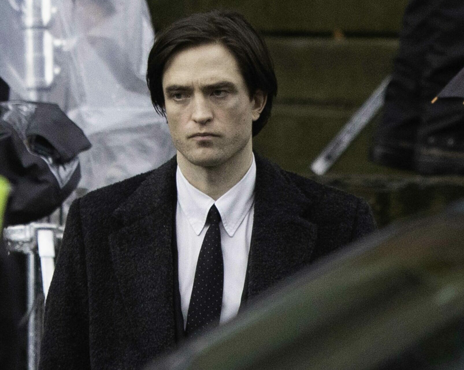 Robert Pattinson wears a covid face mask between takes filming Batman in Liverpool, UK.