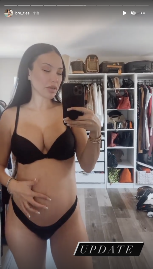 Bre Tiesi taking a mirror selfie.