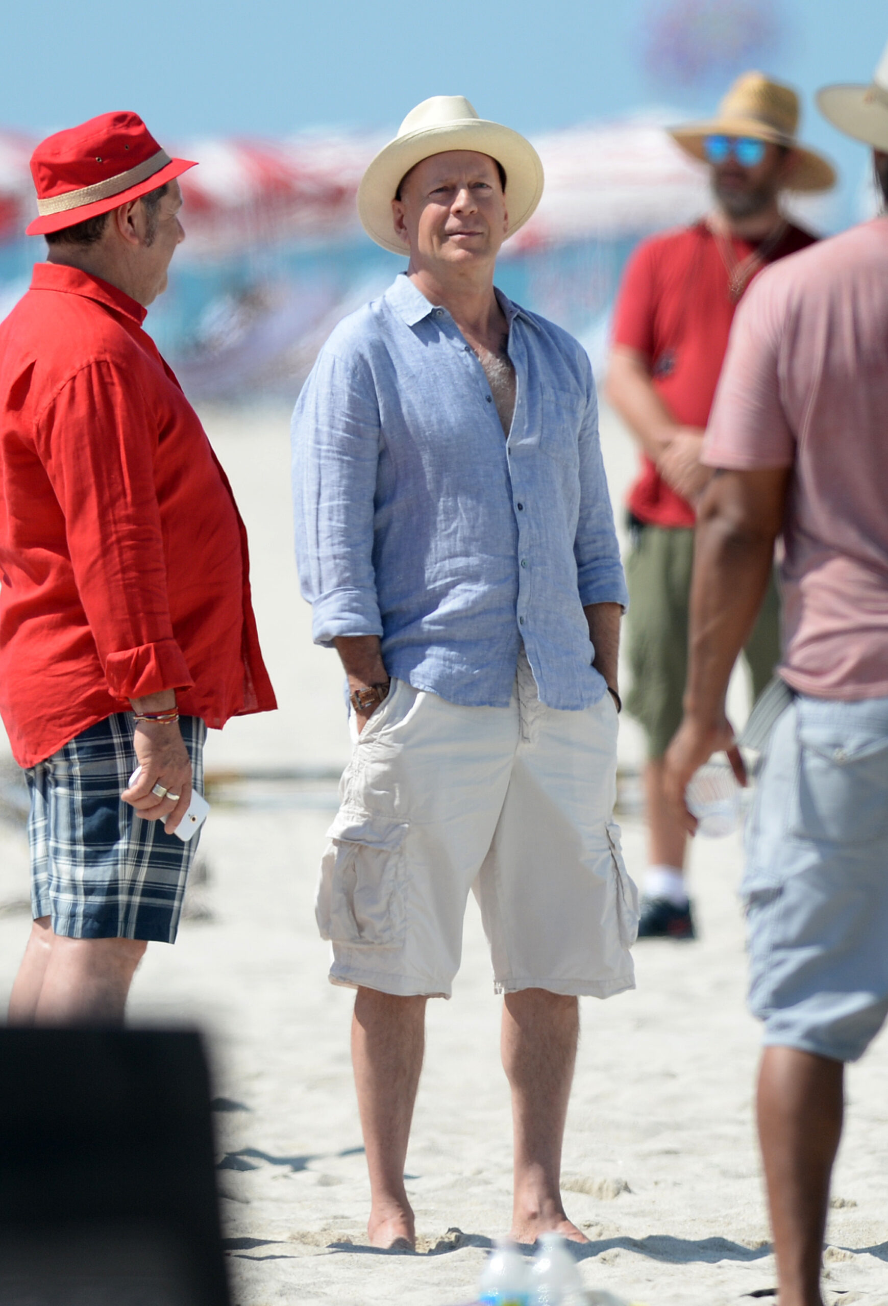 Actor Bruce Willis looks like he apos s having a great time with bikini-clad girls while he film a commercial for Faena in Miami Beach