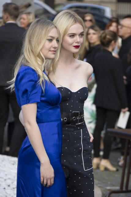Elle and Dakota Fanning arriving at Miu Miu Show in Paris