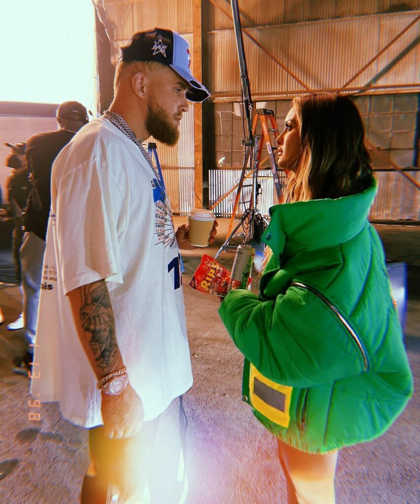 Julia Rose and Jake Paul talking.