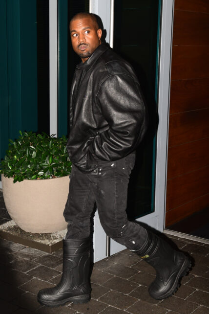 Kanye West is back in his boots as he makes his way around Miami