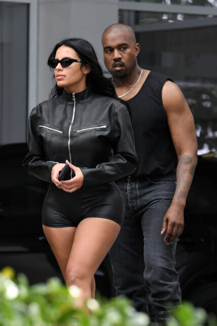 A newly single Kanye West is seen leaving his hotel with new girlfriend Chaney Jones in Miami