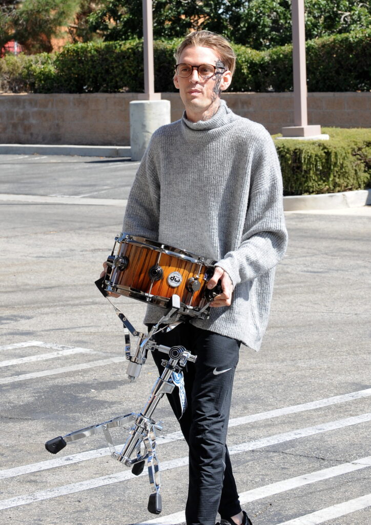 Aaron Carter new face tattoo at the Guitar Center
