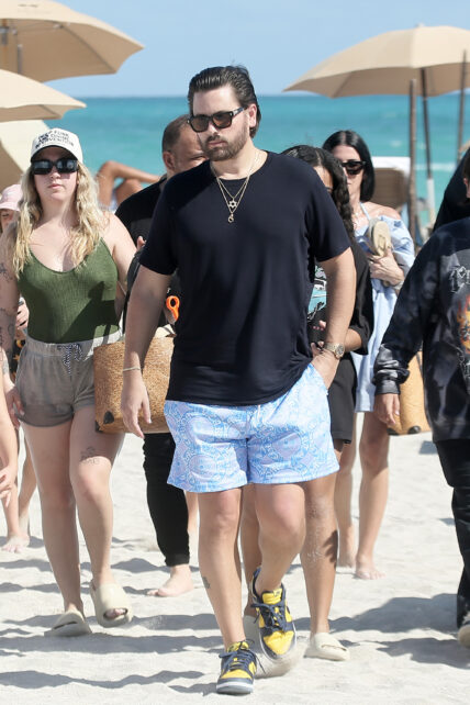 Scott Disick looks relaxed as he spends time with his 3 children on the beach in Miami