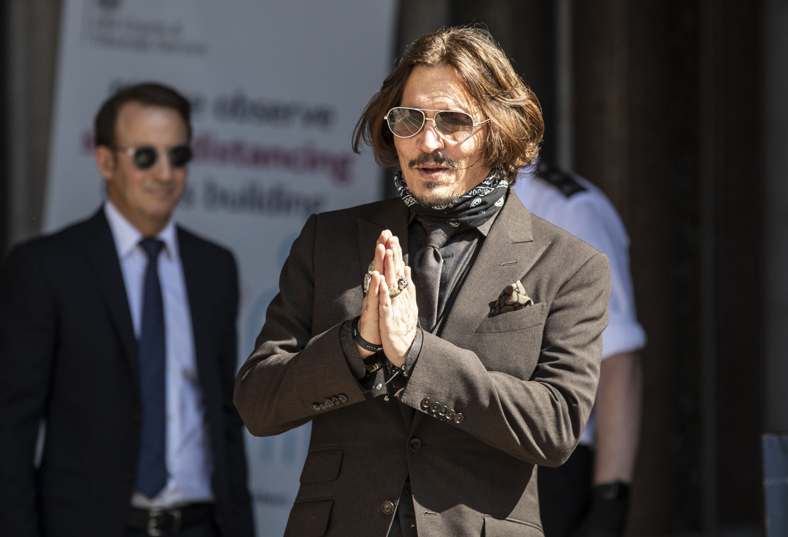 Actor Johnny Depp arrives at the High court in London as the legal action against The Sun newspaper continues.