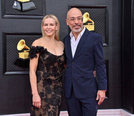 Chelsea Handler and Jo Koy arrive for the 64th annual Grammy Awards at the MGM Grand Garden Arena in Las Vegas, Nevada on Sunday, April 3, 2022.