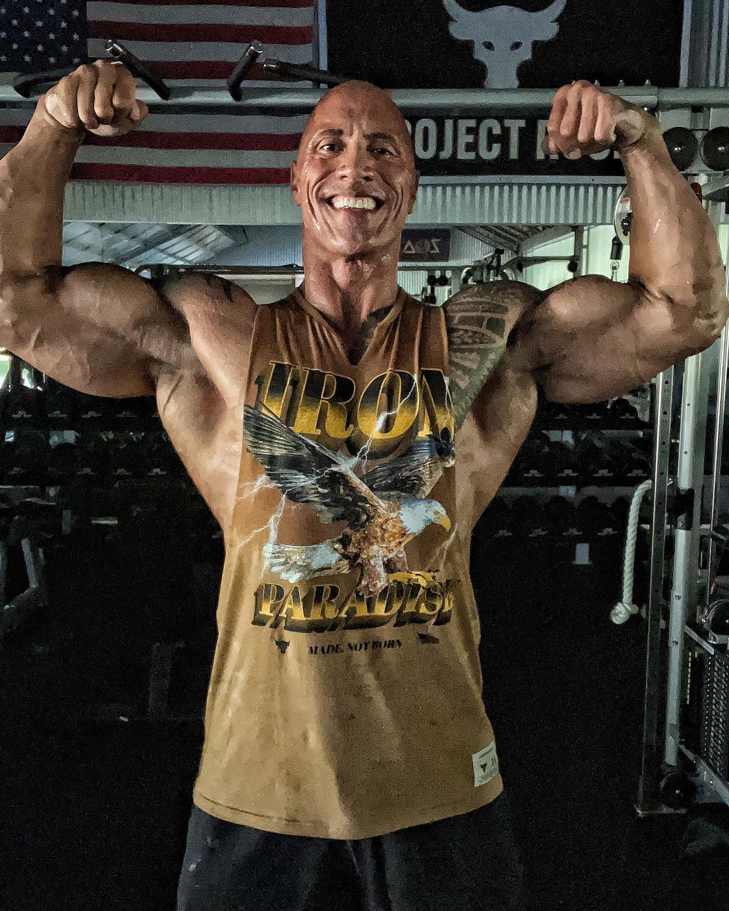 Dwayne Johnson flexing on May 28, 2022