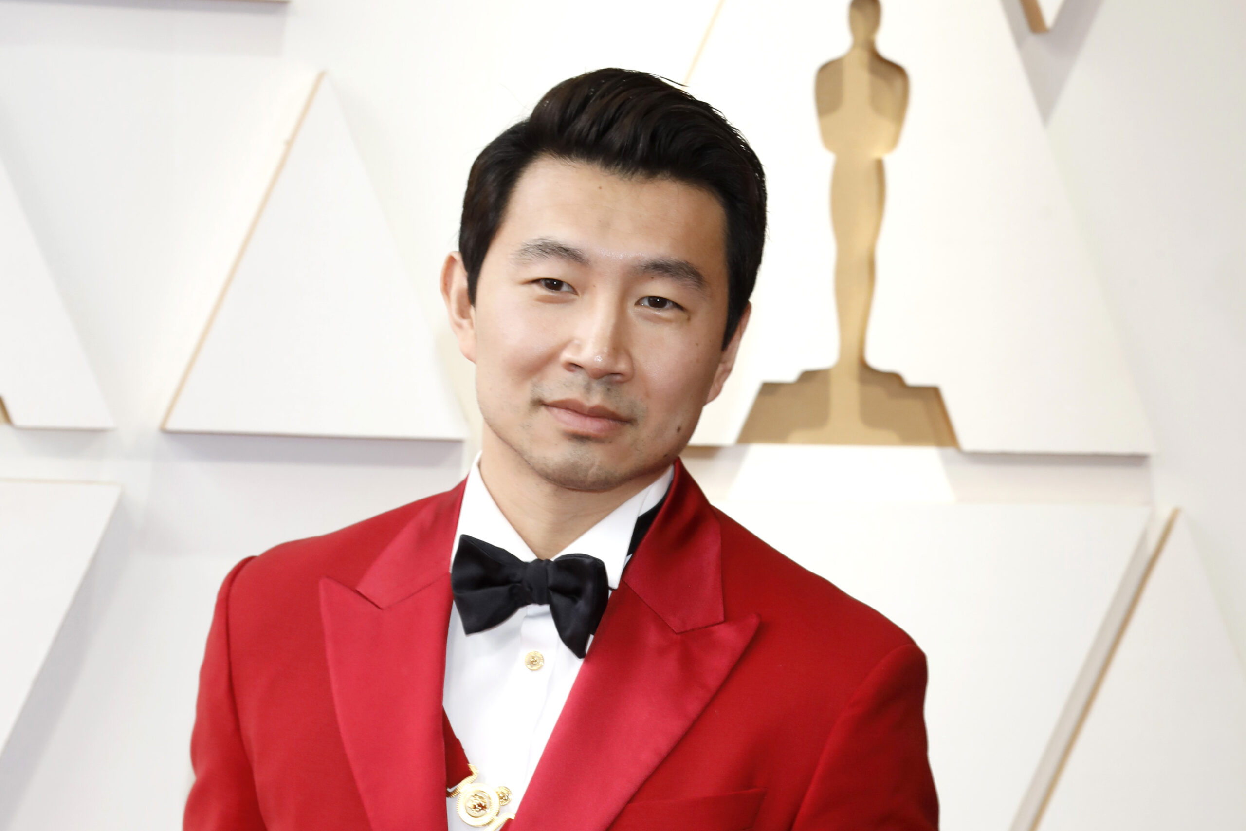 Simu Liu at the 94th Academy Awards at Dolby Theater on March 27, 2022 in Los Angeles, CA
