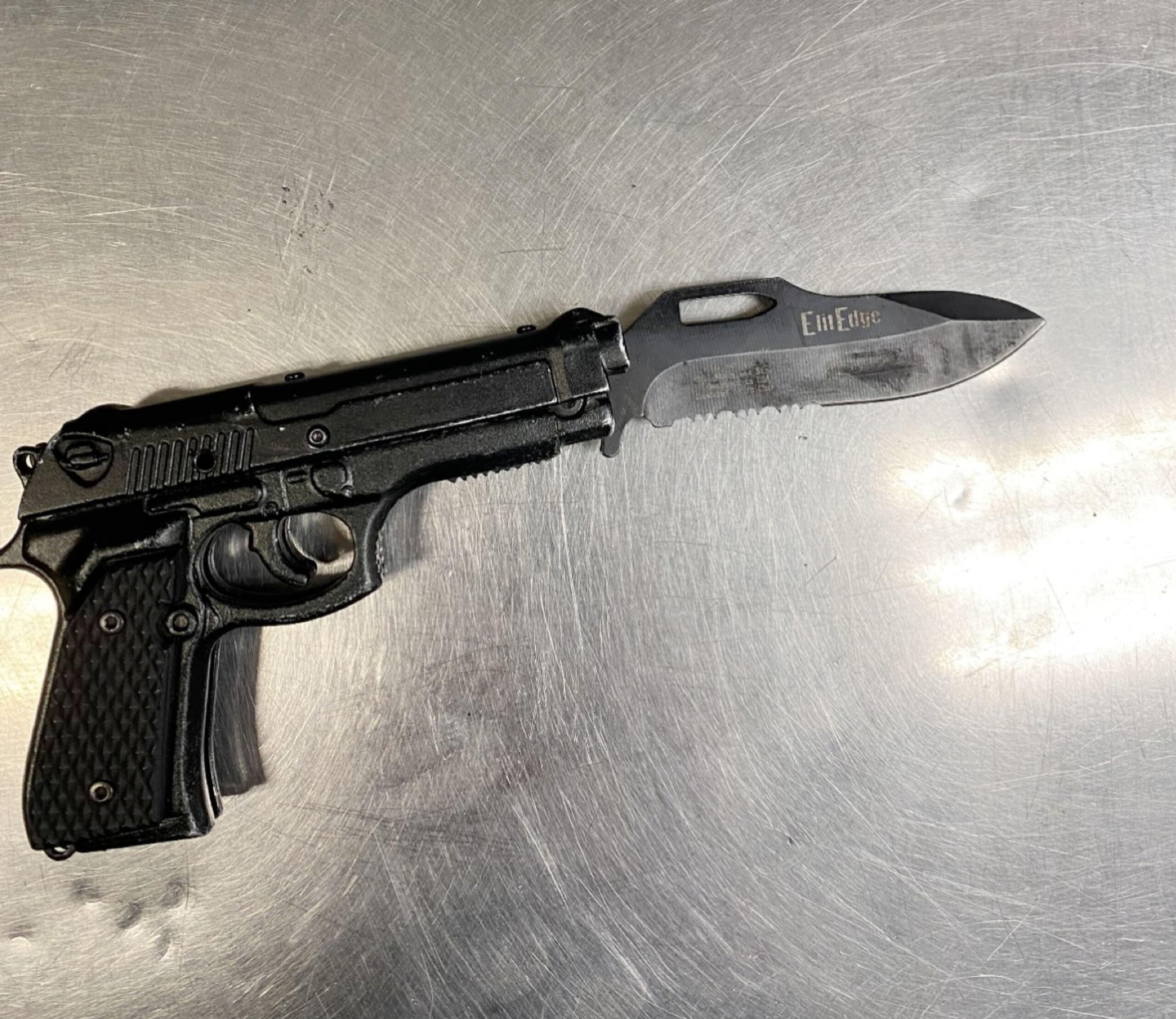 Replica handgun with bayonet-style knife attached held by attacker who tackled Dave Chappelle onstage