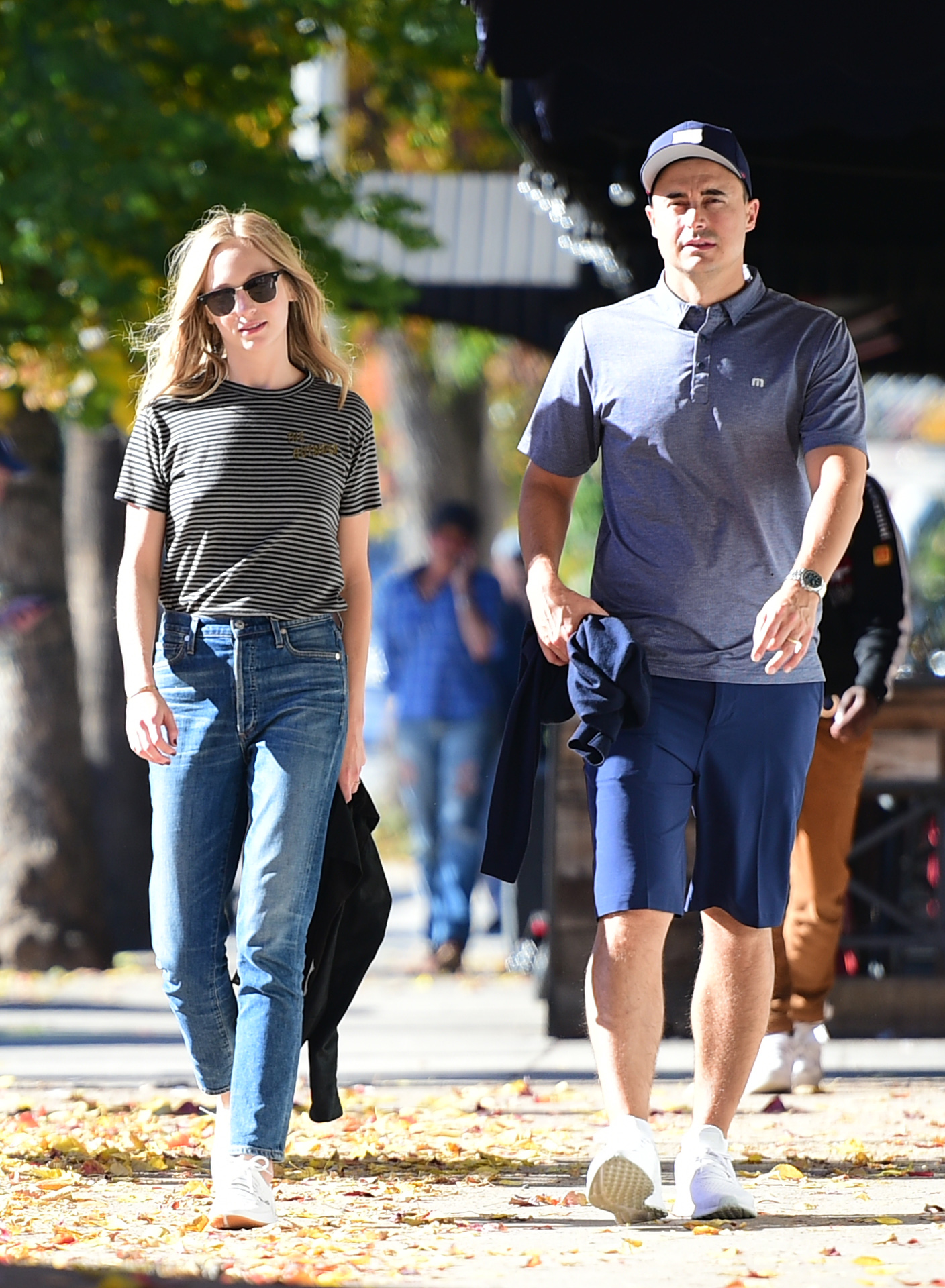 Candice Accola King and husband Joe King take a walk