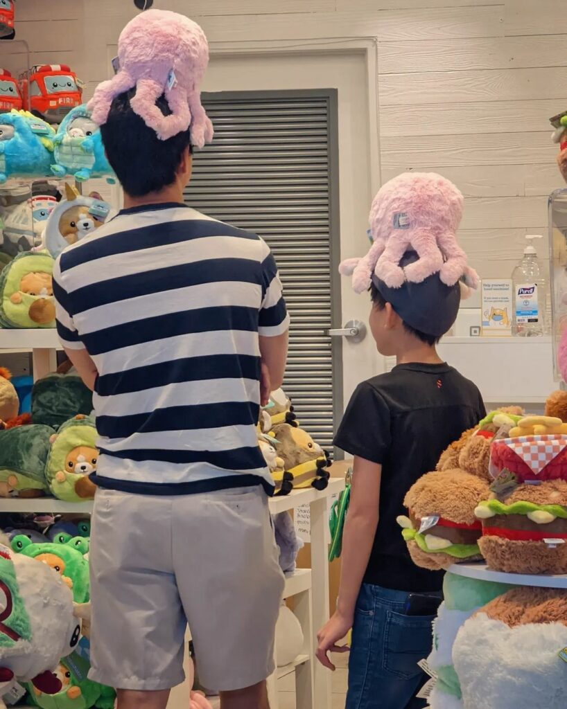 Jennie Nguyen's husband and son posing.