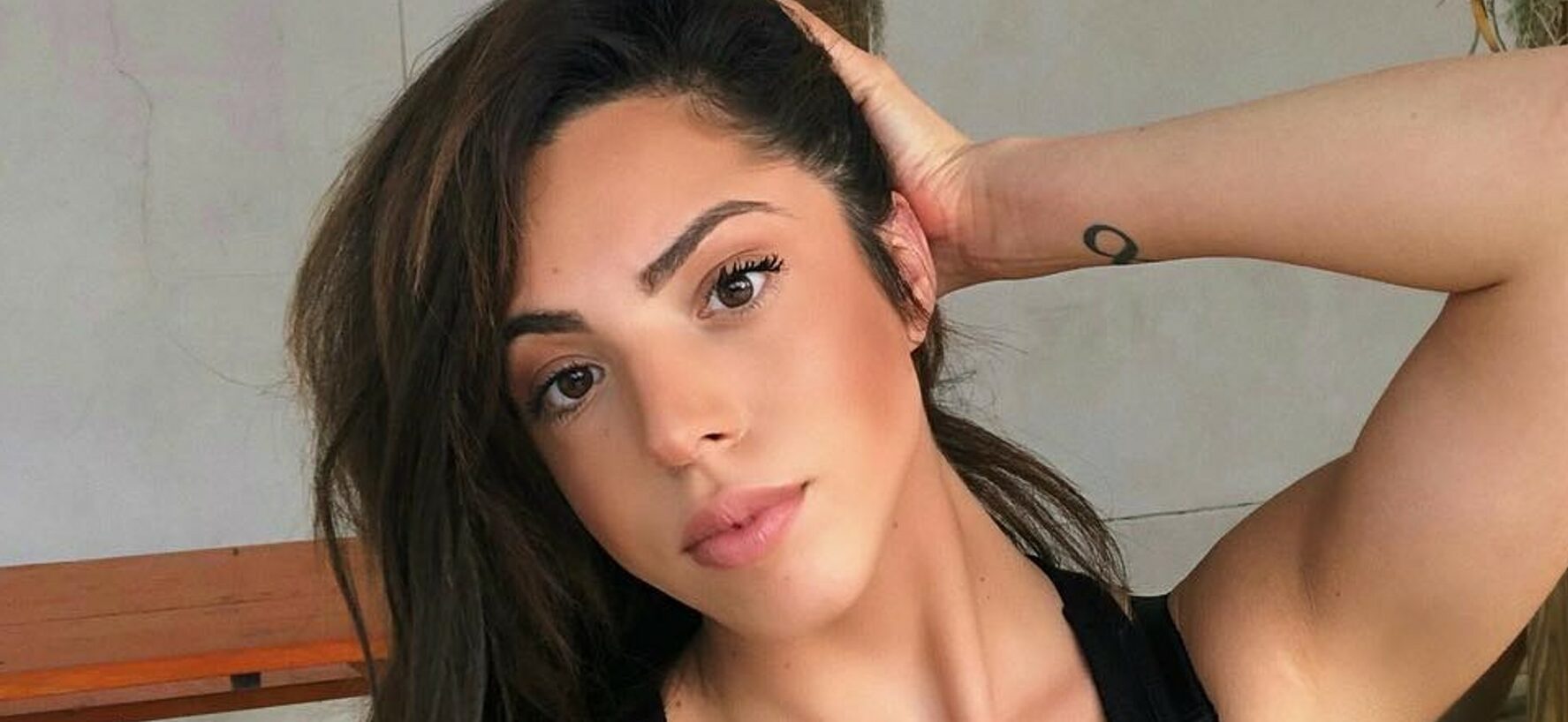 Danielley Ayala Lets Massive Chest Hang While Sipping On Drink